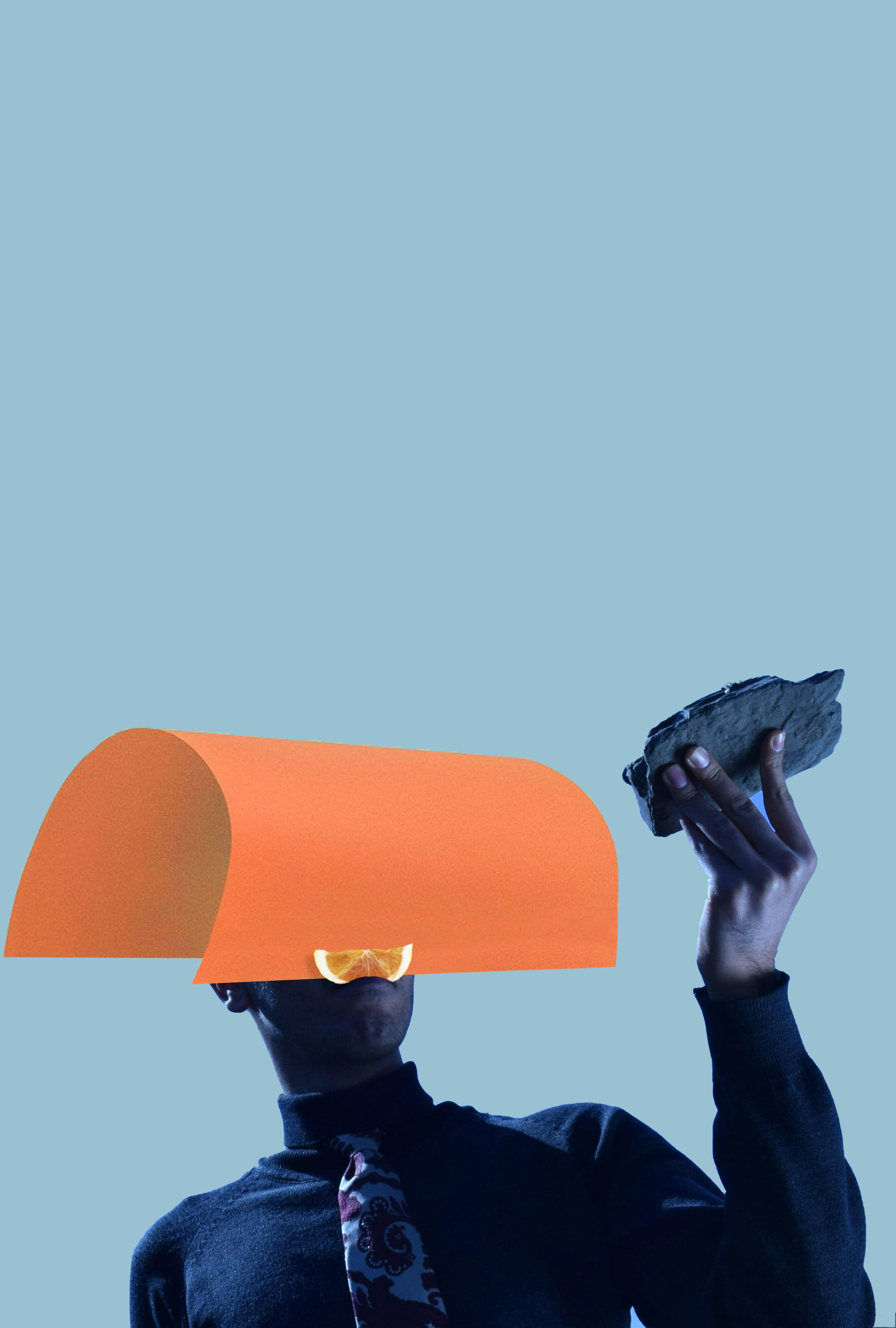 person looking at stone